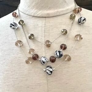 Triple strand beaded necklace